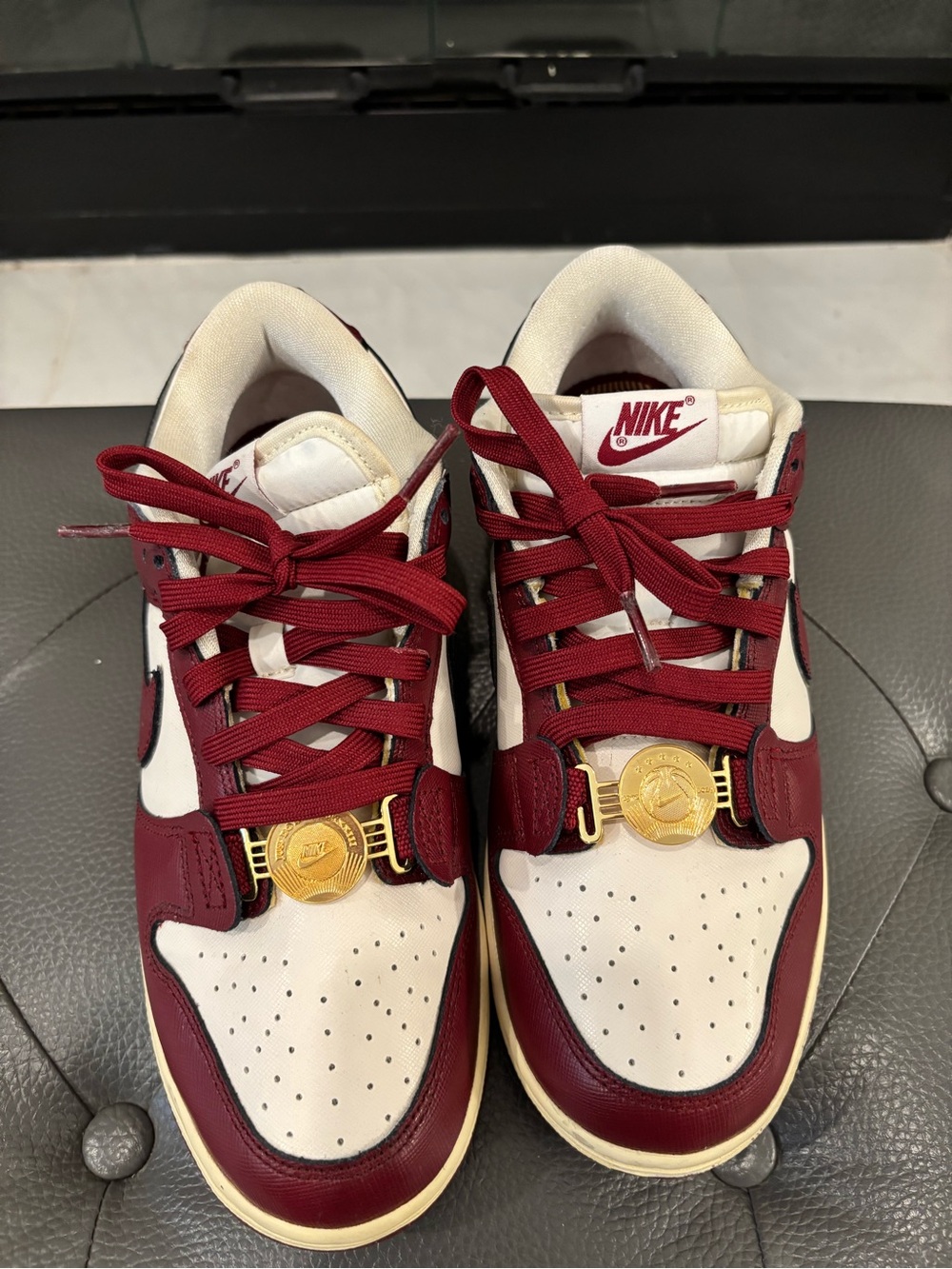 Nike Low-Top Sneakers in Burgundy, White and Gold Accent